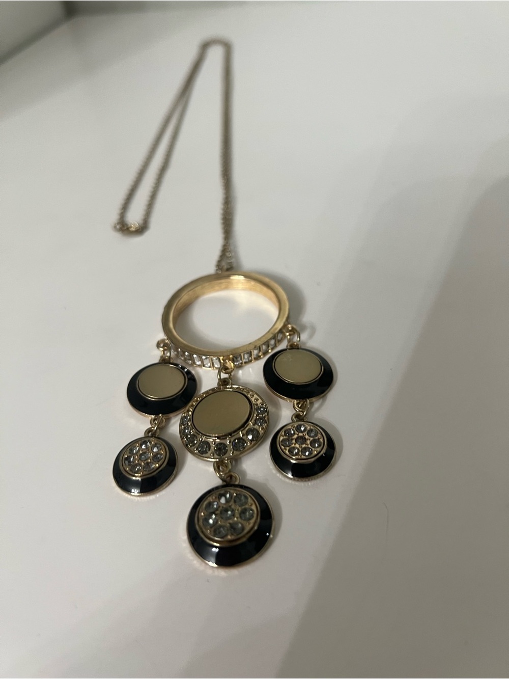 Belle Noel Gold Tone Pendant Necklace with Black and Cream Accents